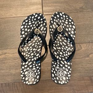 Tory Burch flip flop.